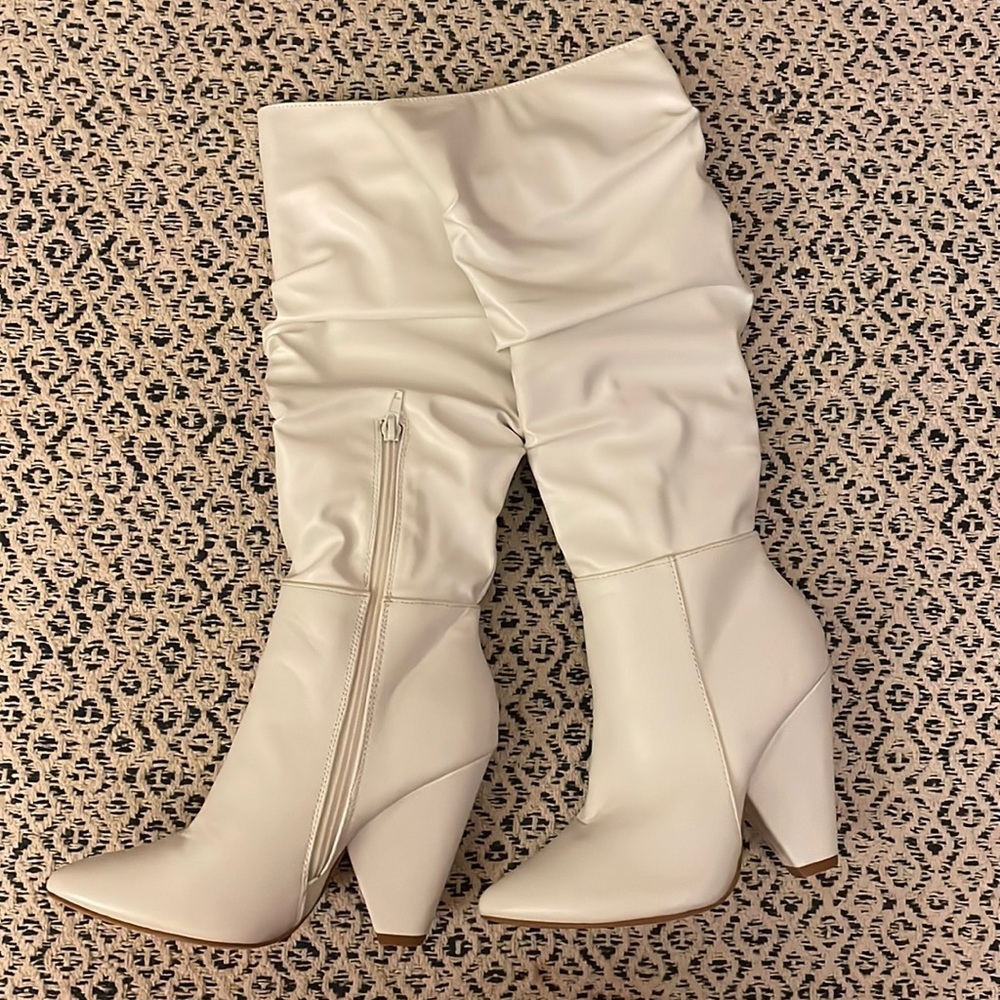 White knee high boots